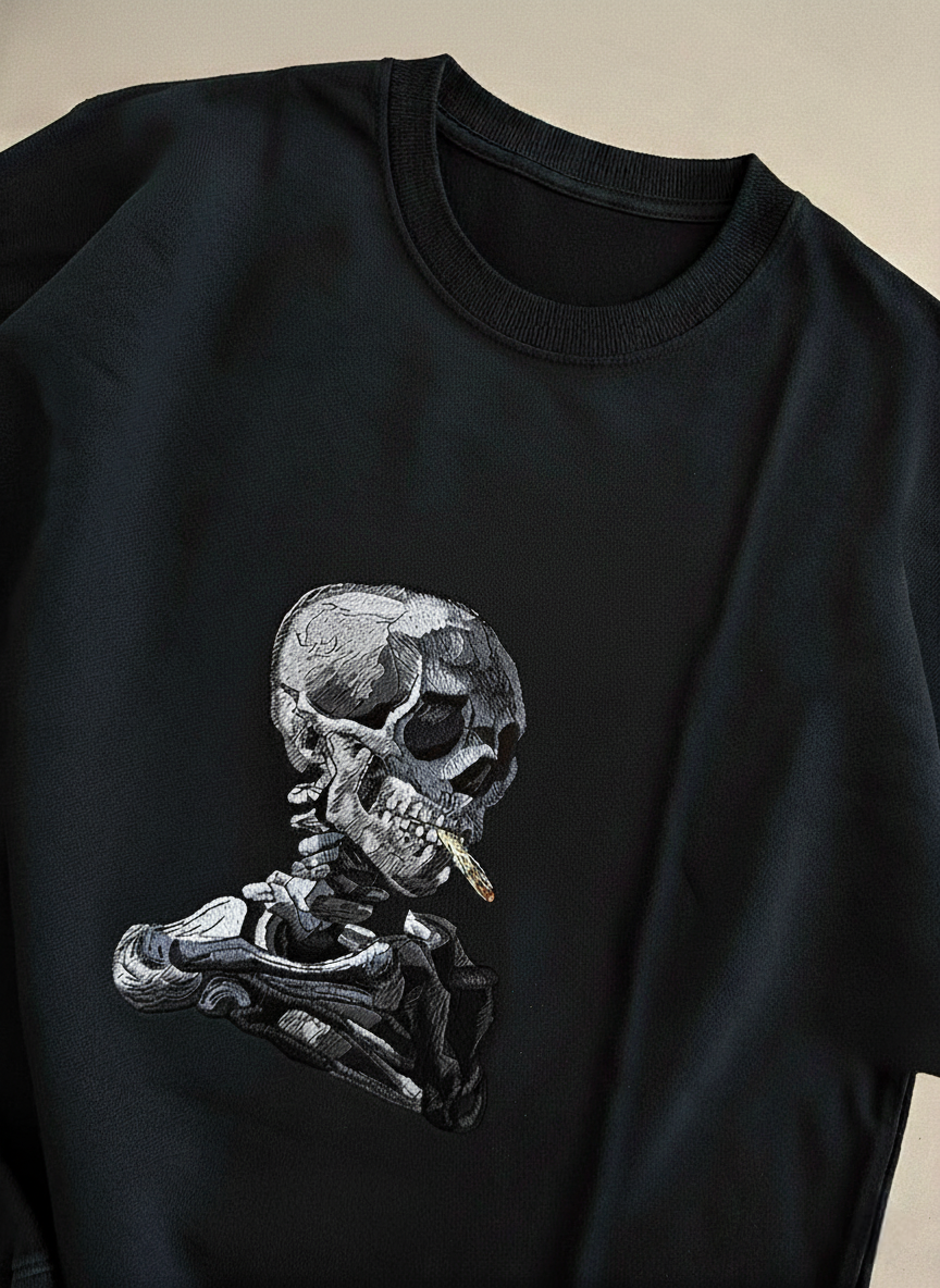 SKULL OF A SKELETON WITH BURNING CIGARETTE OVERSIZED T-SHIRT